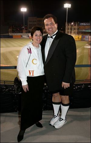 SHORTSTOP: Brenda and Doug Dymarkowski are sportily attired for the gala.