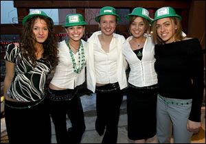 IRISH SMILES: From left, Erin Kander, Katie Skelton, Emily Werner, Maggie Herrick, and Caroline Stoy pause for a pose at St. Ursula's 'Sham-rockin' Good Time.'