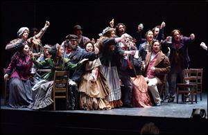 The Toledo Opera Chorus performs in the November production of Sweeney Todd.