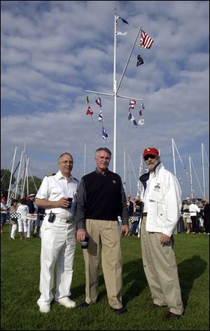 GETTING READY: Jack Pozsik, Alan Wise, and Ron Soka at the pre-race party at the Toledo Yacht Club. 