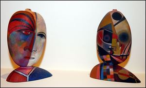 Tom McGlaughlin used glass and coloroed pencil to create these.