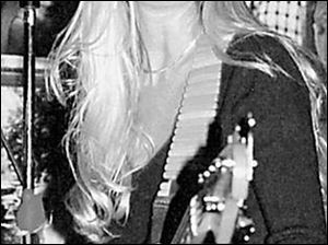 Michelle Poe is awaiting the release of her debut disc.