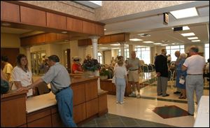 Bryan-area residents get their first look at the entrance of the new, $1.8 million senior center during an open house.