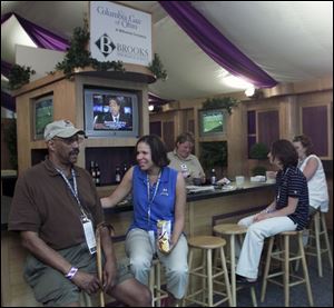 From left, Bob Smith, his daughter Gina Thompson, Heather Biddulph, and Jennifer Homier relax at the Senior Open.