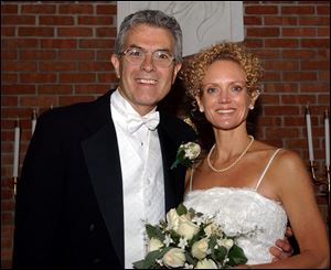 FAMILY CEREMONY: Mark Burton and Nancy Kistler-Burton included their daughters in their wedding.