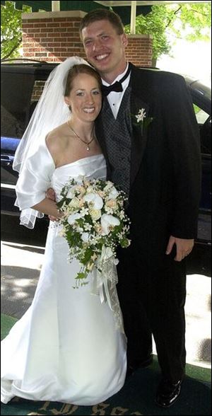 HAPPY COUPLE: Jenny Hills and Eric Kraus, who met on a blind date, were wed at St. Joseph's Church, Sylvania.