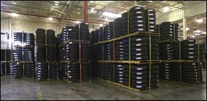 Cooper Tire, owner of this Findlay warehouse, is focusing more on performance models.