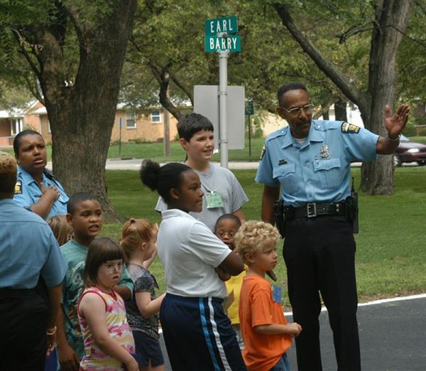 Officer stands at crossroads in SafeTCity The Blade