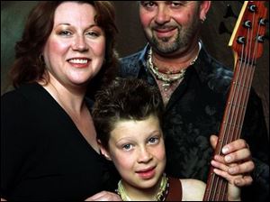 Anita and WIll Mandell say their son, Henry, 8, will always be their top priority.