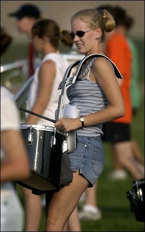 ROV August 20, 2003 - Casey Knoth practices with the University of Findlay Oiler Brass Band Wednesday morning on the University of Findlay campus.  Blade photo by Dave Zapotosky