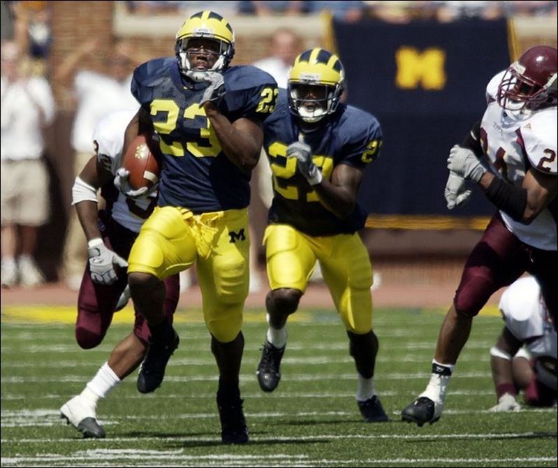 Perry gains 232 in Michigan win Toledo Blade