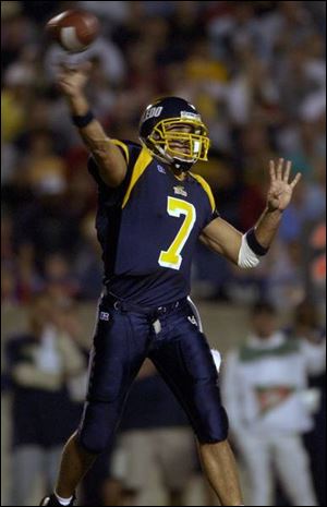 Sophomore Bruce Gradkowski completed 49 of 62 passes for 461 yards and three TDs.