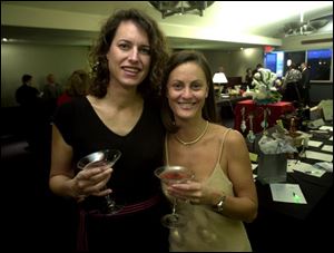 SWANKY:  Terri McCullough, left, and Lisa DeVilbiss were dressed in appropriately swanky evening attire.