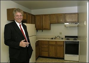 Jim Moody, in a budget apartment in West Toledo, says the city has a plentiful stock of affordable housing.