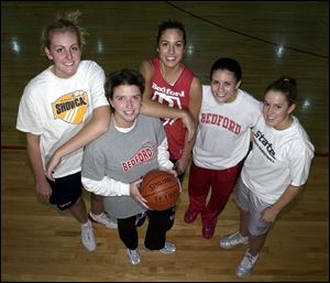 Bedford, ranked fourth among Michigan s Class A teams, include, from left, Laura Hall, coach Amy Schrader, Tara Breske, Kristin Hendricks, and Allison Davis. The Mules are 19-0, 8-0 in the Southeastern Conference.