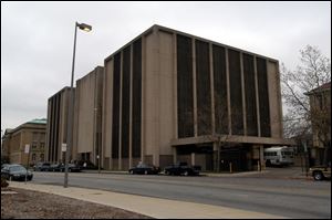 The Lucas County jail on Spielbusch Avenue often is overcrowded. Commissioners are seeking sites for a new jail.