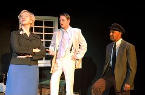 Jean Mills, left, plays Daisy Werthan, Matt Kizaur is her son, Boolie, and Chuck Crockett is Hoke Coleburn in the Toledo Rep's production of <i>Driving Miss Daisy.</i>