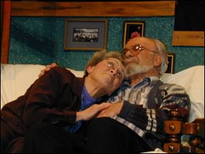 Norman and Ethel Thayer, played by Mark Deerwester of Fostoria and Peg Baker of Tiffin, share a tender moment.