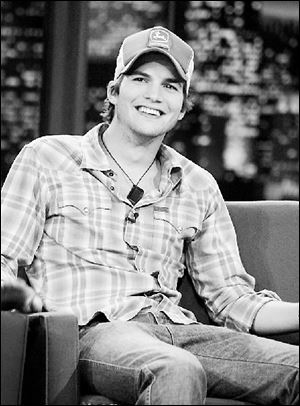 Actor Ashton Kutcher sports a John Deere cap during an August appearance on ‘The Tonight Show with Jay Leno.'