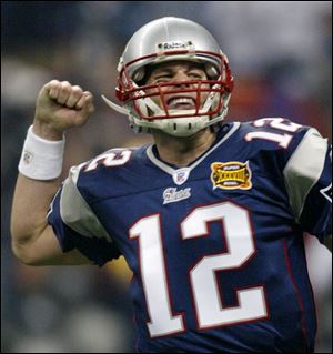 Patriots quarterback Tom Brady passed for 354 yards and three touchdowns to earn his second Super Bowl MVP award in three seasons. The former Michigan quarterback had 32 completions (in 48 attempts) to set a Super Bowl record.