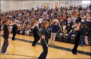 The Evergreen High School band performs during the rally to support the vote for an income-tax request. About 800 people attended.