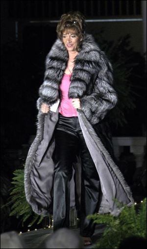 Sweeping coats like this one from Toledo Furs ended the show.