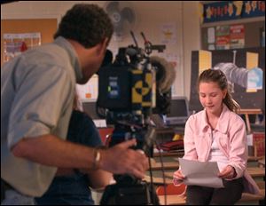 Oregon fifth grader Kari Stausmire is filmed by a <i>Today Show</i> camera for an appearance this week.