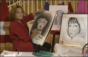 Vicki Hill is a professional artist with a studio at the Erie Street Market, where she shows off her talent doing portraits.