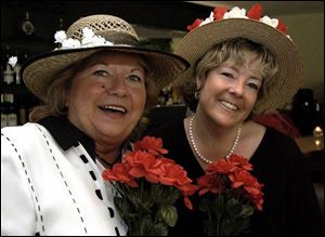 SPRINGTIME DERBIES: Dorothy Sheehan, left, and Lori Ruzicka show off their hats at Stone Oak Country Club.