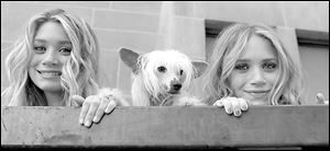 Ashley, left, and Mary-Kate Olsen in <i>New York Minute</i>.