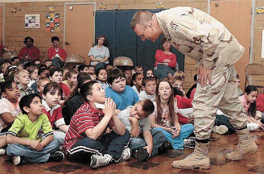 Colonel-gives-third-graders-flag-from-Iraq-Adopted-soldier-visits-elementary-school