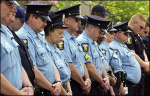 Law enforcement officers remember 62 colleagues who were killed in the line of duty.