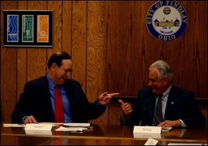 Gov. Bob Taft has a laugh with Mayor Tony Iriti during his visit to Findlay yesterday.