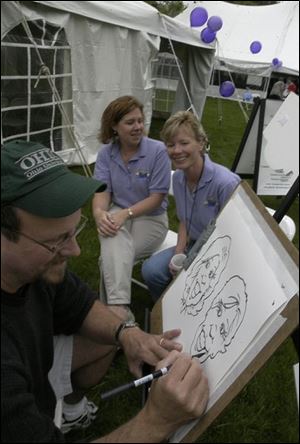 Mike Tippett sketches Rita Hutchner and Julie Rubini at the Maumee festival. It recalls Mrs. Rubini's late daughter, Claire.