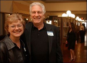 HAVING A JAZZY TIME: Karen and Ron Rothenbuler have some fun during the River East fund-raiser to benefit the East Toledo-way of life.