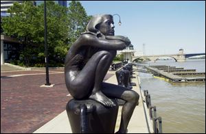 One of five figures in <i>Family</i>, by Penelope Jencks of Massachutsetts. The works are in Promenade Park downtown.