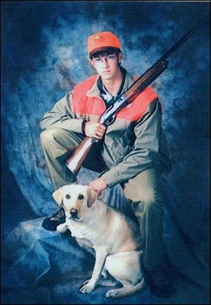 Matthew Dierker of Eastwood High School posed with his shotgun and yellow lab, Shy-Ann when he had his senior pictures taken. He wants to become a wildlife biologist.