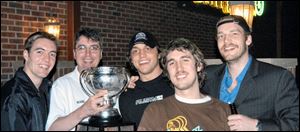 Alexandre Jacques, Claude Noel, Nathan Lutz, Brian Finley, and Andrew Hutchinson are all former Storm players affiliated with the AHL champion Milwaukee Admirals in 2004. Noel, also a former Storm coach, led the Admirals to the title last season.