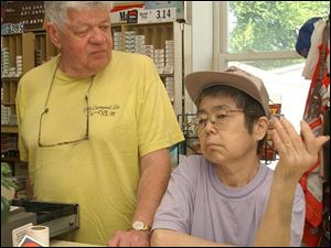Miwako 'Micky' Tooley and husband, Joe, run a convenience store. She was dropped by her insurance carrier and then stricken with cancer.