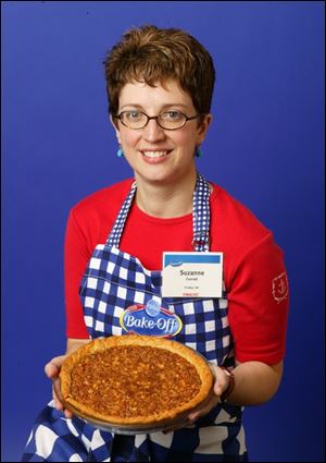 Suzanne Conrad of Findlay displays her prize-winning Oats 'n Honey Granola Pie.