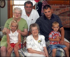 Five generations of the Yenrick family: front row from left, great-great-great-granddaughter Rebekah Yenrick, 5; Cornelia Palmer, 100, great-great-grandson Palmer Yenrick, 3; top row from left, daughter Jne Yenrick, grandson Robert Yenrick, and great-grandson Robert Yenrick.