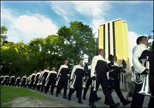 The Glassmen march through the UT campus before a recent competition.