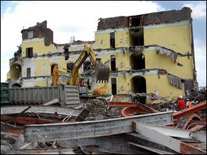 Rov Phopto by Don Simmons August 3, 2004  Demolition show the interior walls  of the old  Gunckel School at the intersection of Nebraska and Division Sts