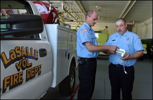 Brian Moyer, left, and Bob Navarre of the LaSalle Township Volunteer Fire Department.
