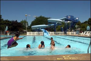 Youngsters enjoy the public pool in Archbold in Fulton County.