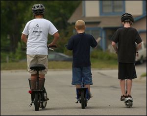 The increased use of motorized scooters by young riders has authorities concerned about regulations controlling their use, rider safety, and the enforcement of traffic laws. 