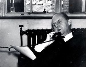 Journalist Fernand Auberjonois, who retired in 1983, dictates a story to The Blade from his London office in January, 1966.