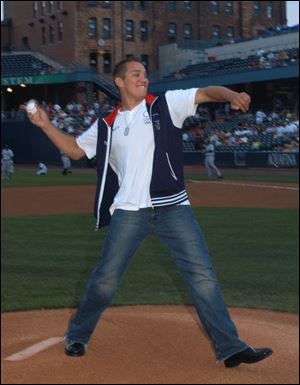 Devin Vargas, the Toledo heavyweight boxer who competed for the United States in the Summer Olympics at Athens, threw out the ceremonial first pitch before last night's Hens' game.