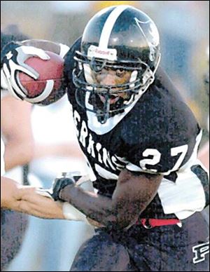 Perkins High School's Aaron Richardson runs for a touchdown in thsi 2002 photo.