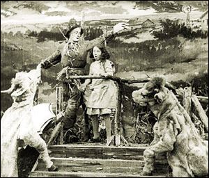 A scene from the 1910 film <i>The Wonderful Wizard of Oz</i> shows Dorothy, the Scarecrow, and other characters. The work, preserved by the George Eastman House, is the first surviving film of the novel by L. Frank Baum.